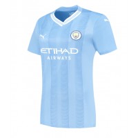 Camisa de Futebol Manchester City Manuel Akanji #25 Equipamento Principal Mulheres 2023-24 Manga Curta